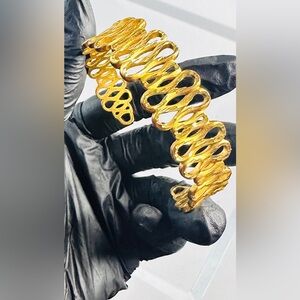 18 karat Gold plated Spiral Adjustable Bangle.